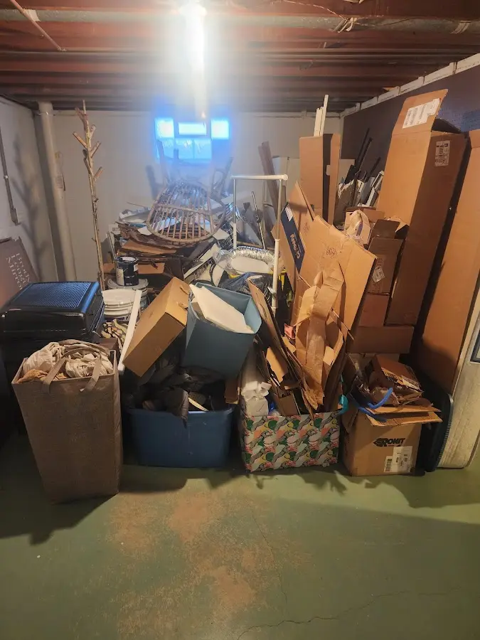 Roll-off dumpster container at job site for 6 Yard Dumpster Rental in Caldwell